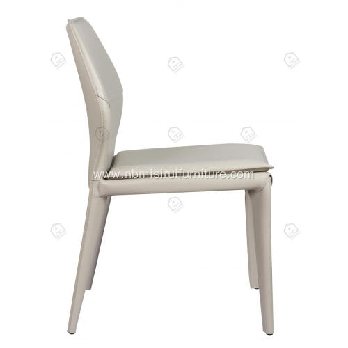 White saddle leather armless dining chairs